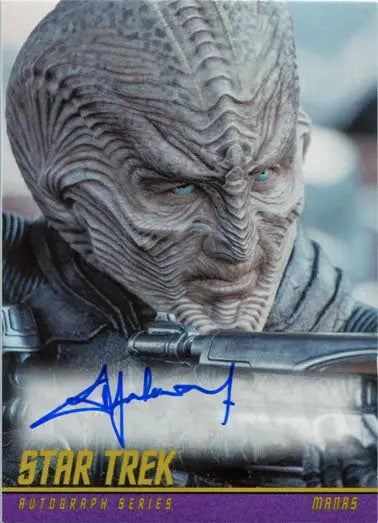 Alien creature with ridged pale skin and blue eyes from Star Trek, Joe Taslim trading card