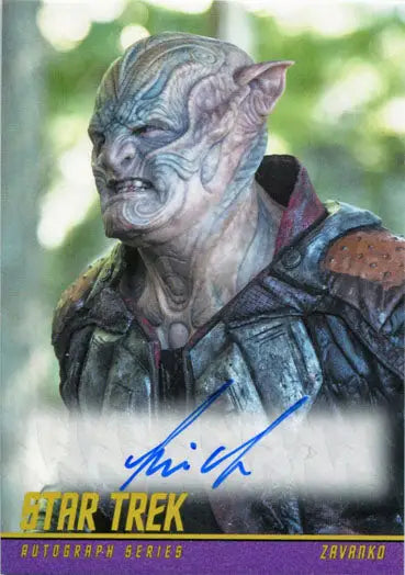 Alien creature with blue-gray skin in armor, Kim Kold as Zavanko trading card