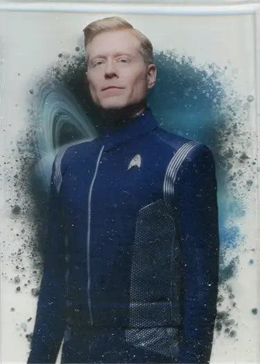 Man in blue Starfleet uniform as Paul Stamets on Star Trek Discovery Character Card