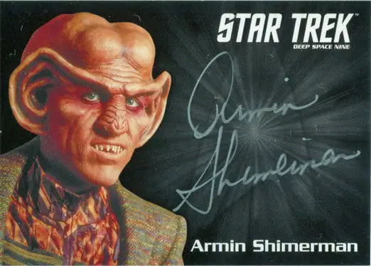 Alien with orange skin and prominent forehead ridges in Armin Shimerman trading card