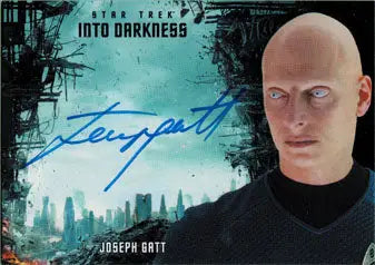 Bald man in a black turtleneck with futuristic cityscape, Joseph Gatt Autograph Card