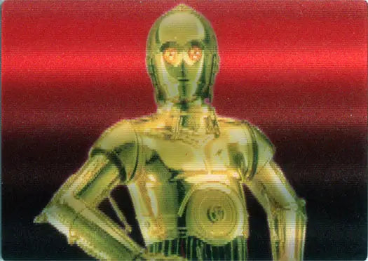 Golden humanoid robot C-3PO with glowing eyes on Star Wars trading cards display