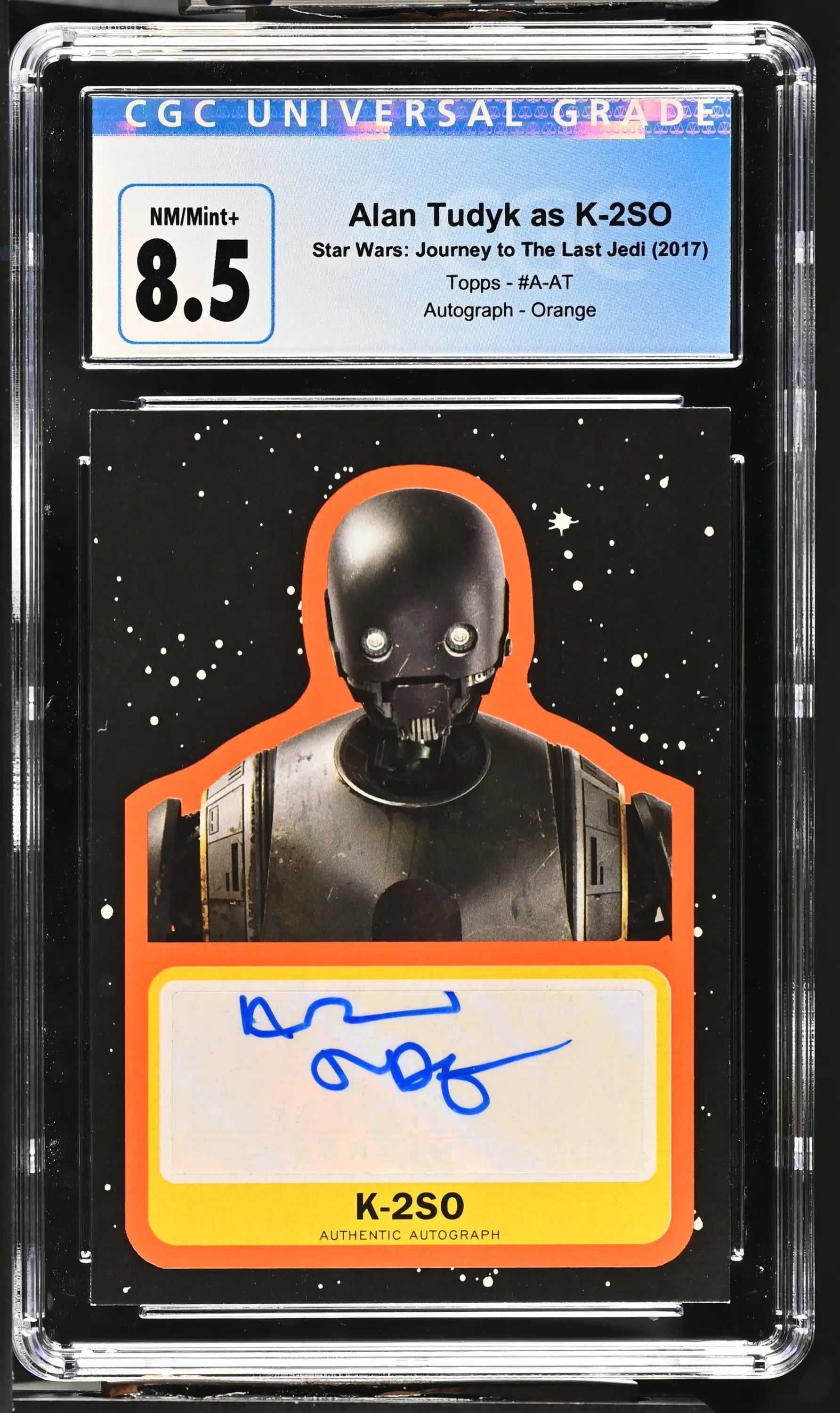 Graded Star Wars Autograph Card featuring K-2SO in protective holder against starry backdrop