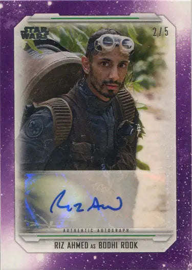 Trading card of Riz Ahmed as Bodhi Rook in tactical gear from Star Wars