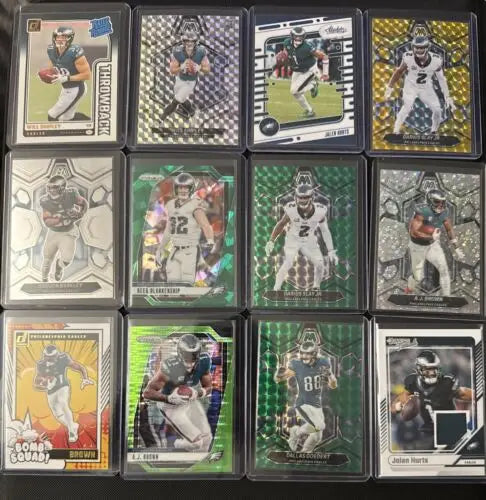 Philadelphia Eagles trading cards in a Super Bowl Winning 12 Card Lot featuring Hurts and Brown