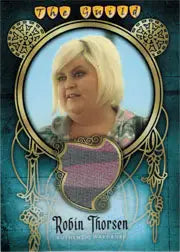 Circular portrait of a blonde woman in purple top, Robin Thorsen trading card variant