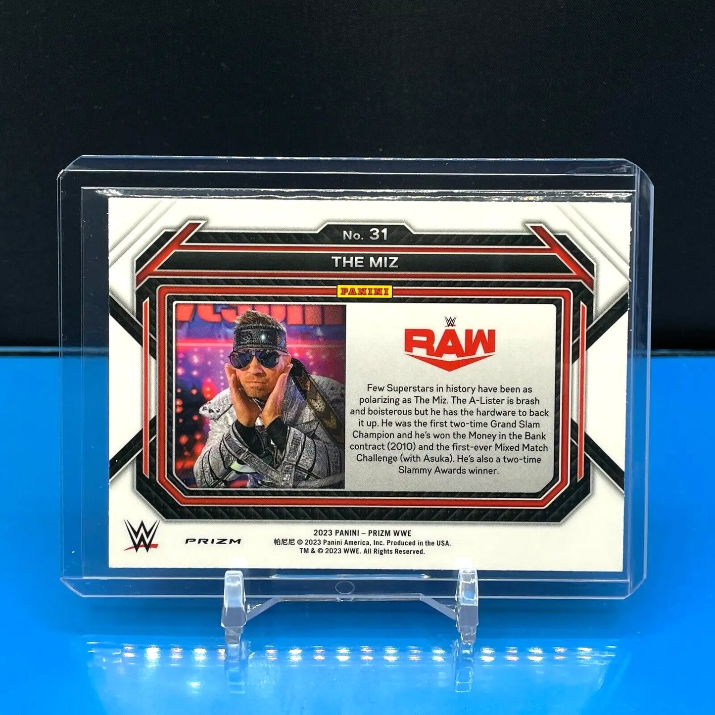 WWE Panini Prizm trading card in a protective case featuring The Miz in black attire