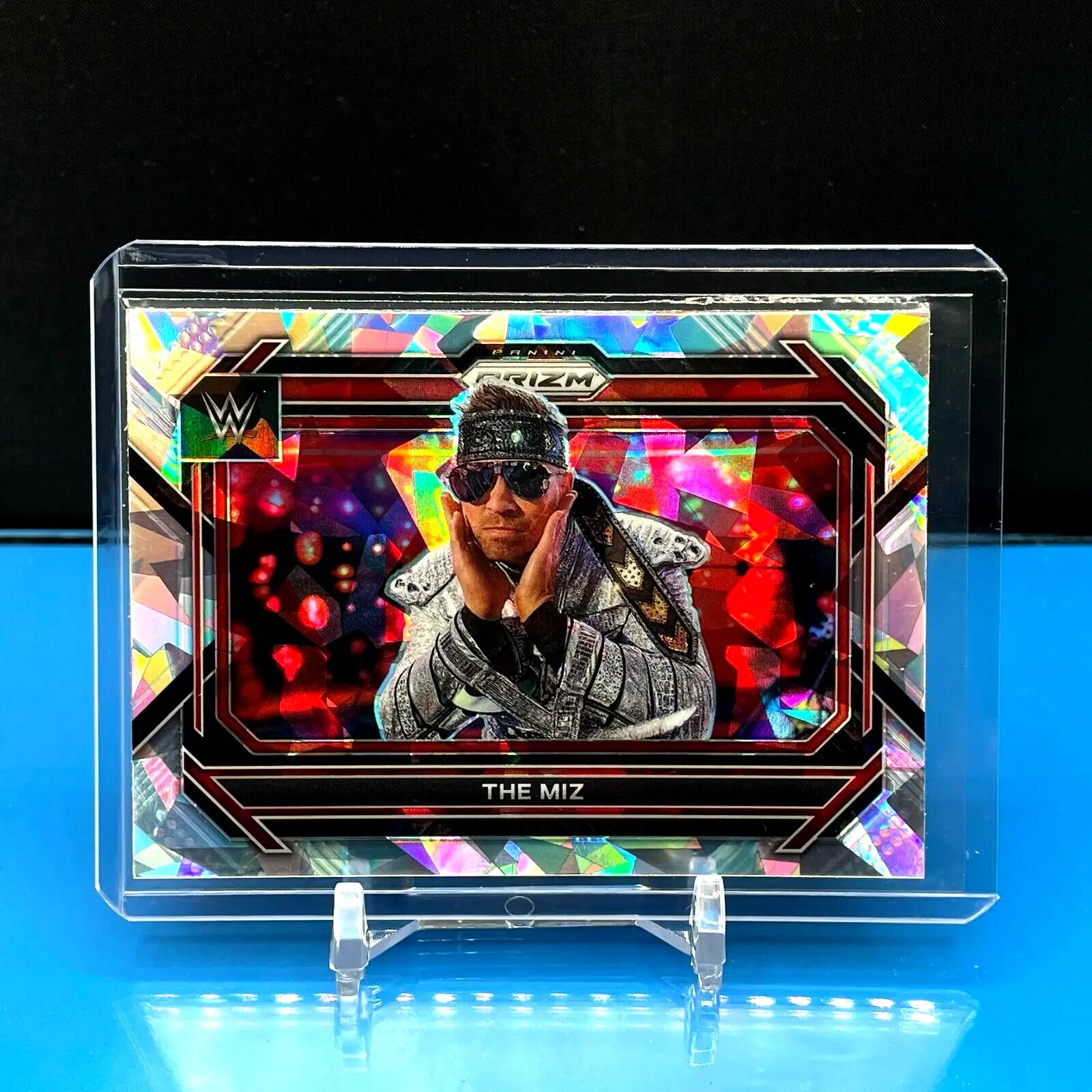 Holographic WWE Panini Prizm trading card of The Miz in sunglasses and leather jacket