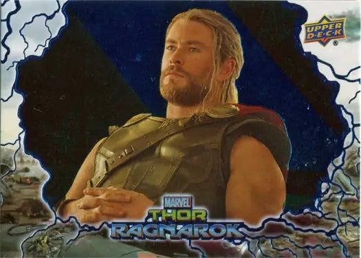 Muscular man in armor with long blond hair on Thor Ragnarok blue foil trading card