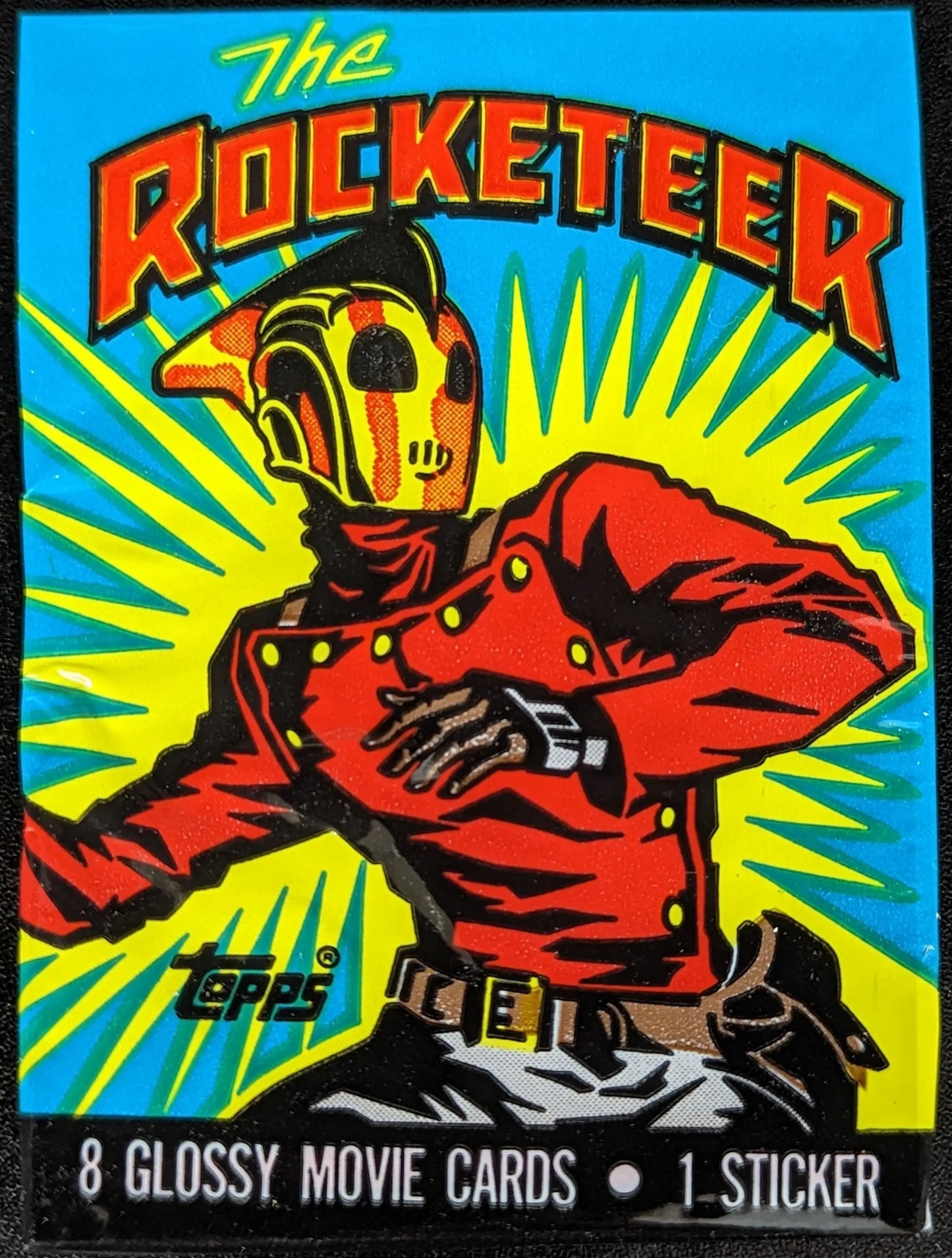 Colorful Topps 1991 Rocketeer Movie Trading Card Pack featuring retro helmeted figure