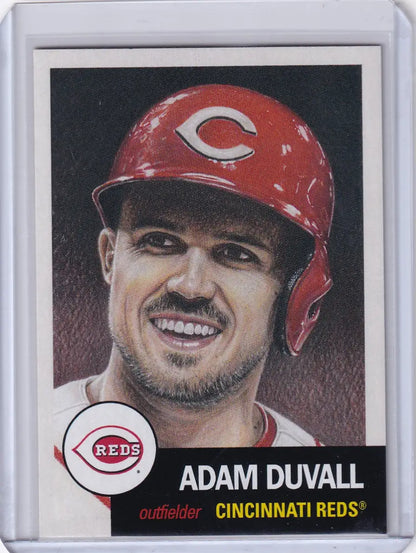 Baseball card of Adam Duvall in Cincinnati Reds helmet from Topps Baseball Living Set