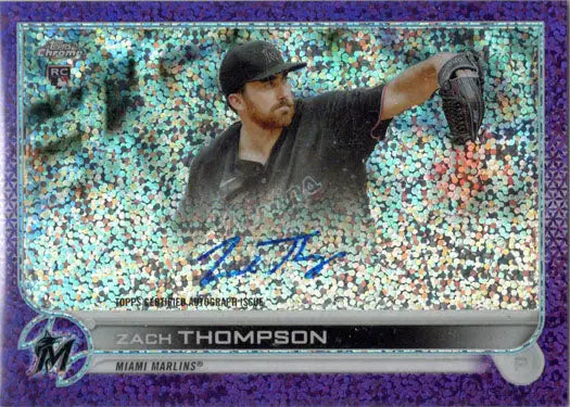 Baseball card of Zach Thompson in mid-throw, featuring a purple sparkle effect