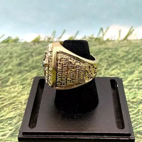 Gold championship ring for Troy Aikman’s Replica Ring from Dallas Cowboys Super Bowl XXVII