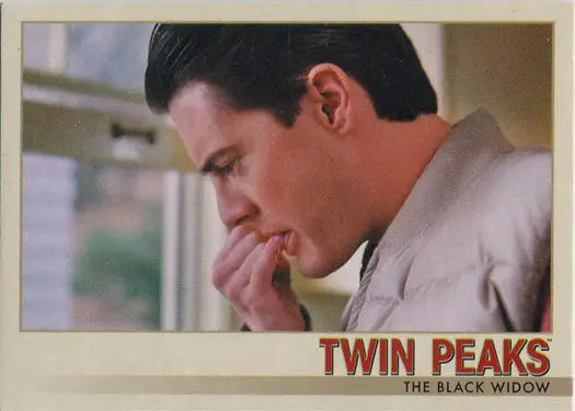 Man in white suit jacket biting thumbnail, pensive expression on Twin Peaks Base Parallel Card