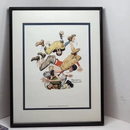 Framed Norman Rockwell illustration of Sporting Boys playing, perfect for collectors and fans