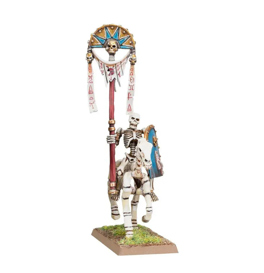 Skeleton figurine of a Skeleton Horseman with staff in Warhammer Tomb Kings model