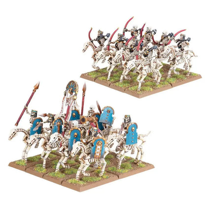 Miniature Skeleton Horsemen from Warhammer Tomb Kings, featuring pink banners and blue shields