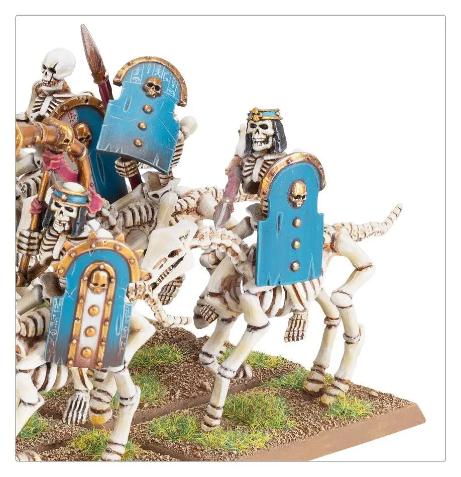 Skeleton Horsemen in battle poses with blue shields and weapons from Tomb Kings