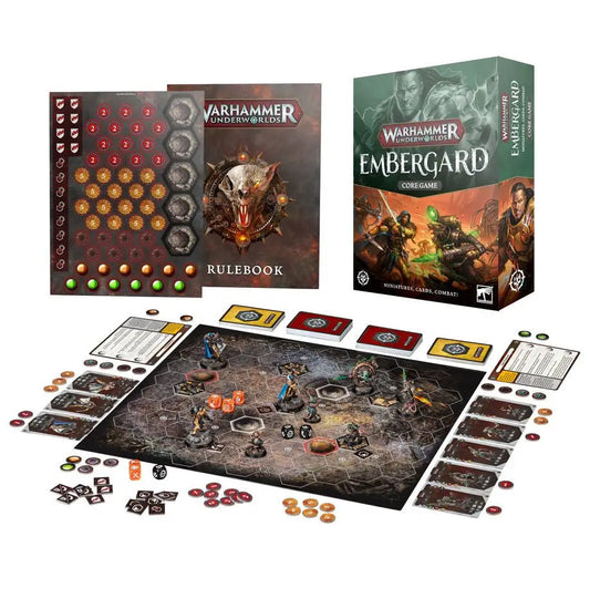 Warhammer Underworlds: Emberguard game setup with miniatures, rulebook, and trading cards