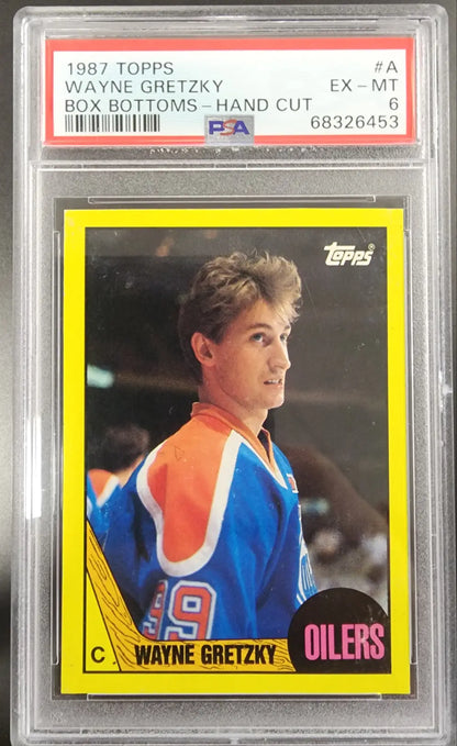 PSA-graded 1987 Topps Wayne Gretzky Oilers hockey card in protective case for sale