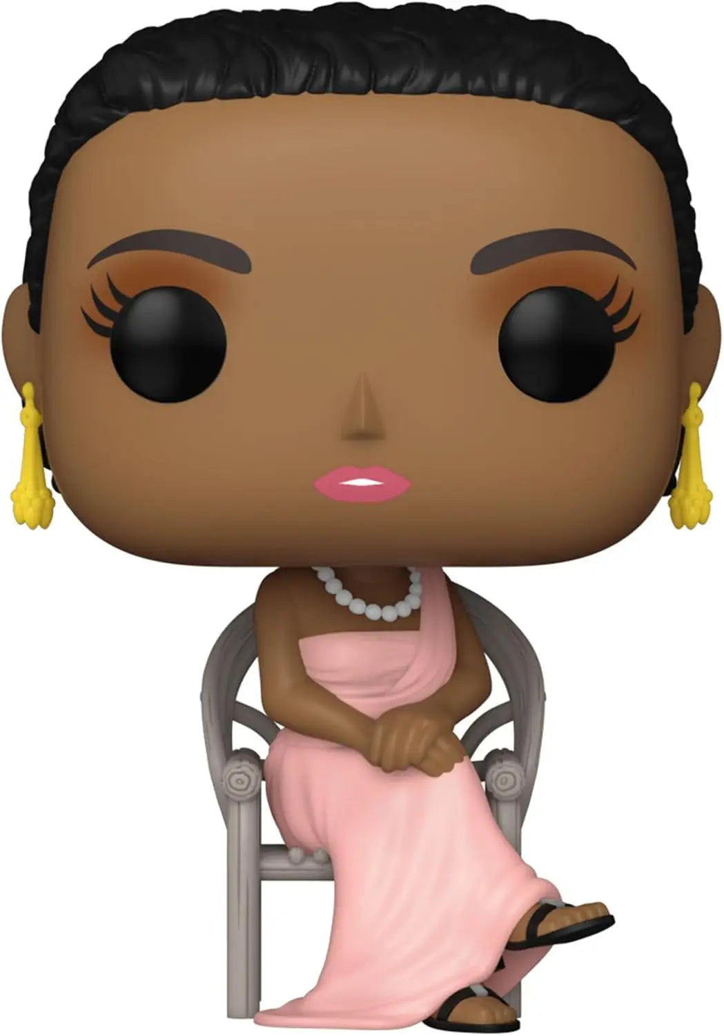 Whitney Houston Funko Pop figure in debut outfit with pink dress and pearl necklace