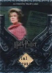 Trading card featuring person in pink striped sweater from Harry Potter Proclamations Prop Card