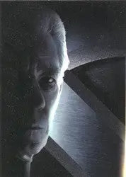 Shadowy close-up of a face on X-Men Movie X4 Promo Card for trading cards collection