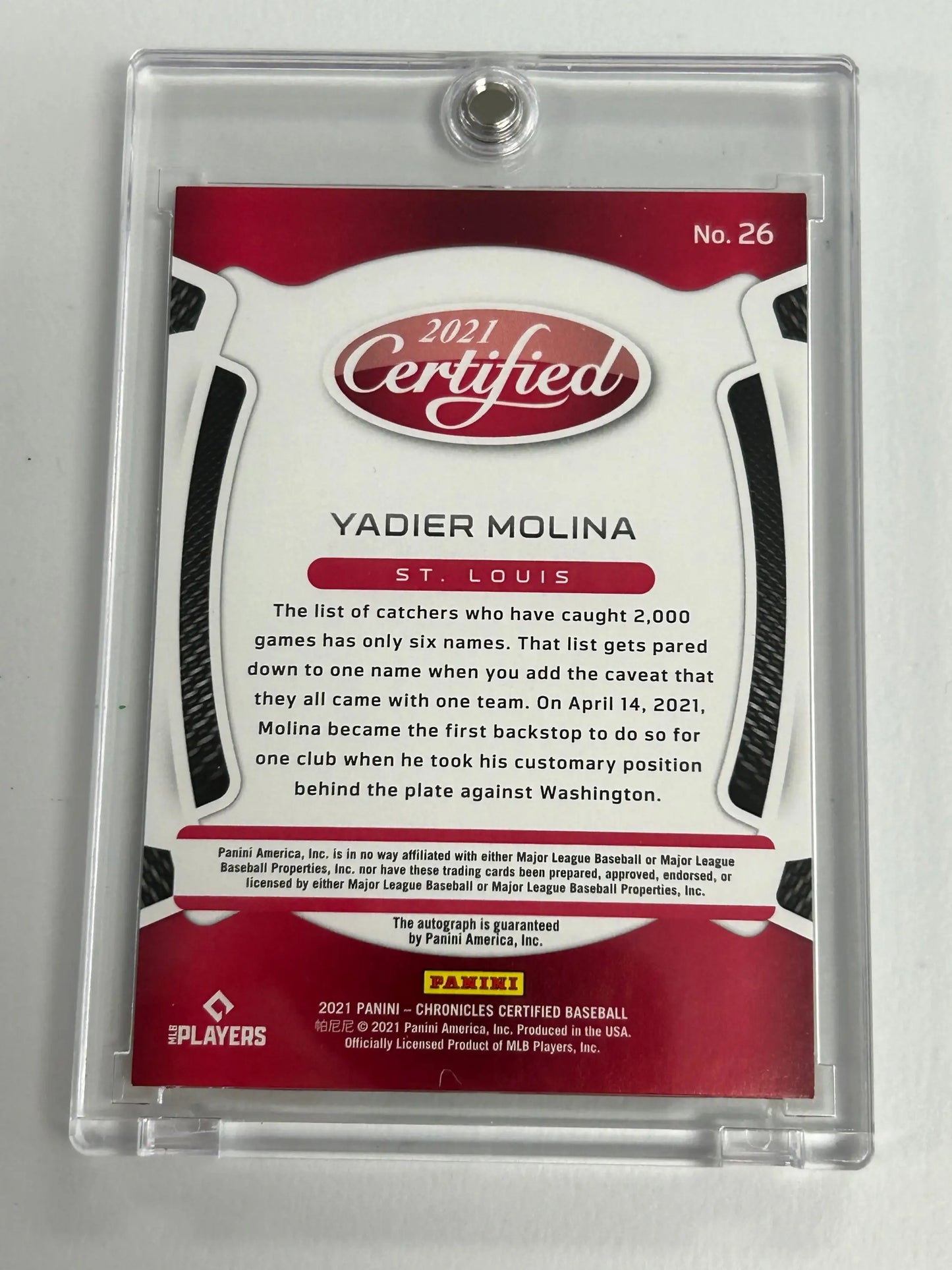 Yadier Molina 2021 Panini Certified Mirror Gold card in a protective case